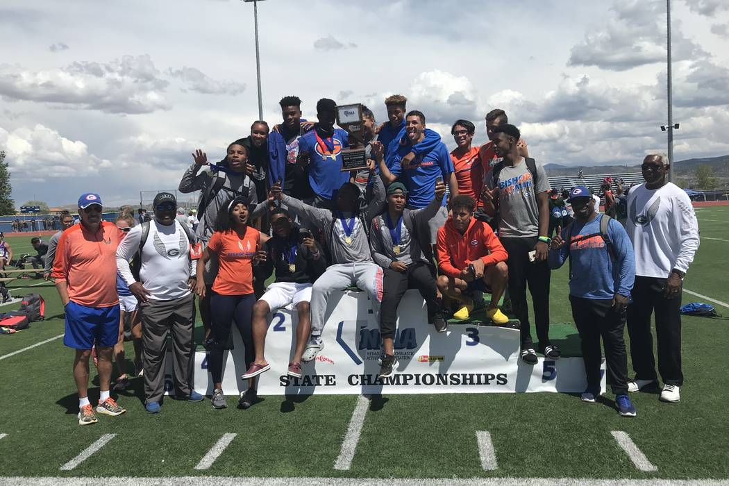 Bishop Gorman’s boys track and field team poses with the Class 4A state championship t ...