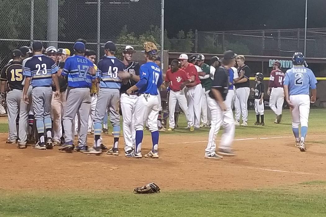 Players shake hands following the Class 4A Senior All-Star Game at Faith Lutheran on Thursda ...