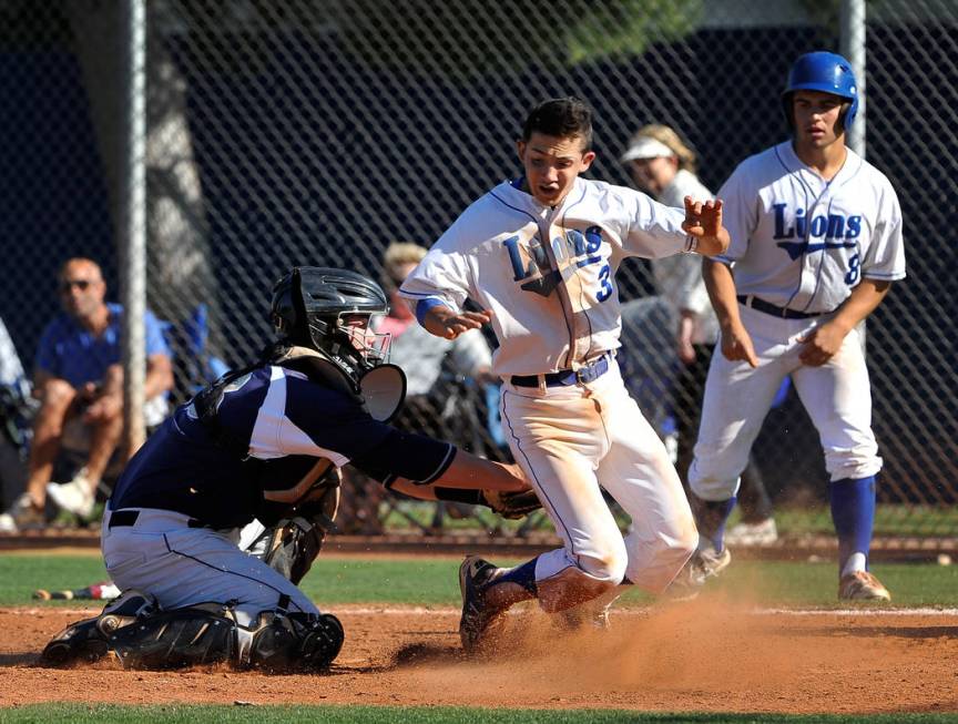 Shadow Ridge catcher Jordan Hand tags out Sierra Vista’s Caeden Marin (3) at home pla ...