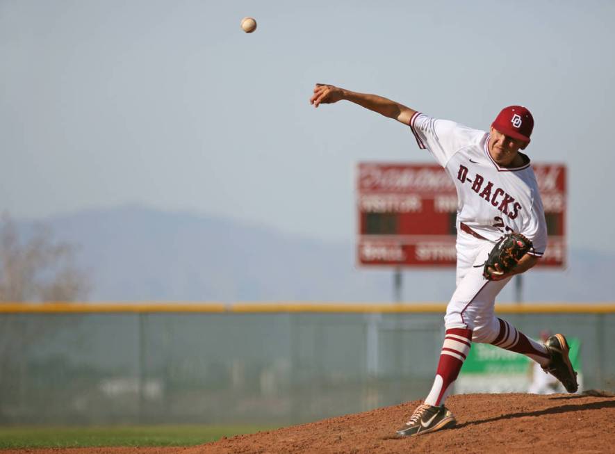 Desert Oasis senior Nolan Kingham pitches during the third inning of a game against Cimarron ...