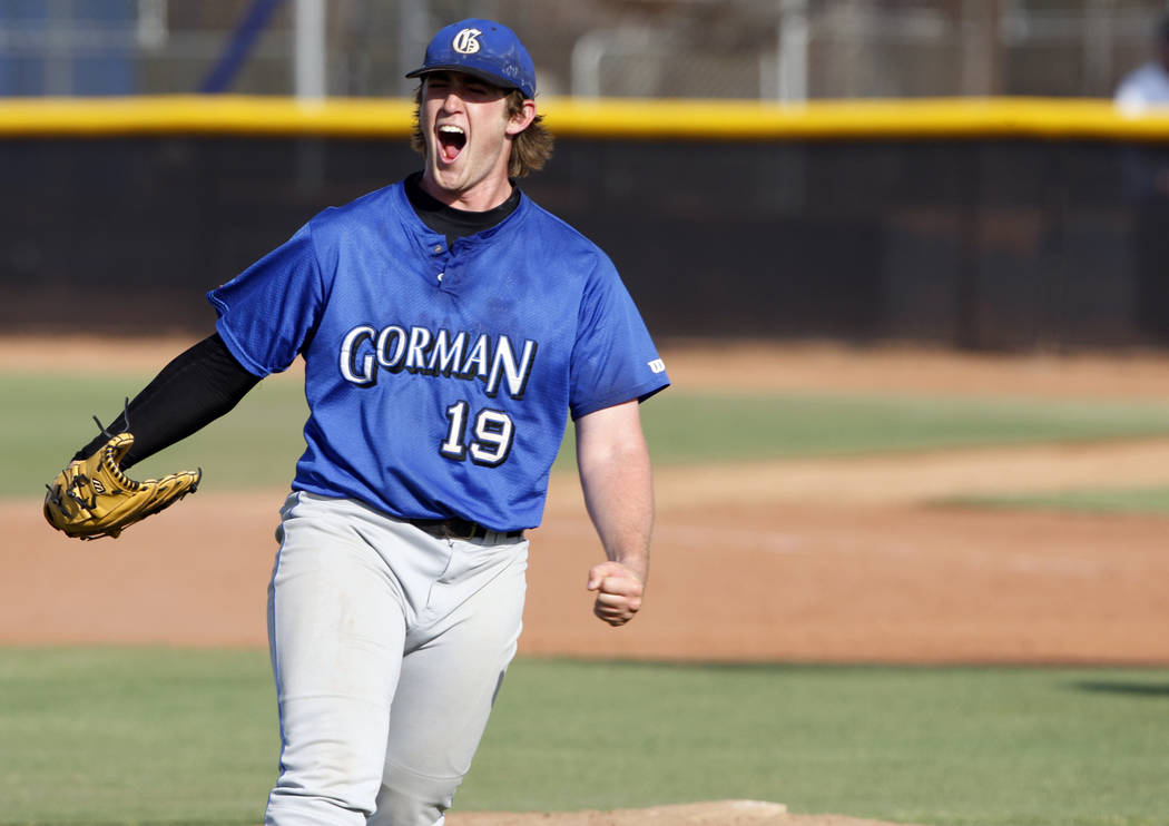 Bishop Gorman High School pitcher Jeff Malm celebrates after striking out the final Green Va ...