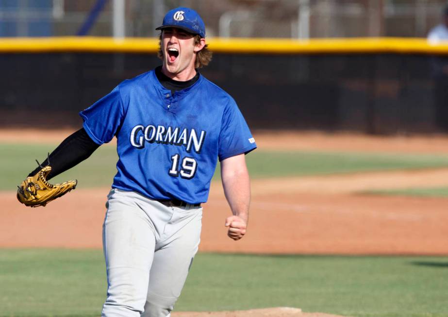 Bishop Gorman High School pitcher Jeff Malm celebrates after striking out the final Green Va ...