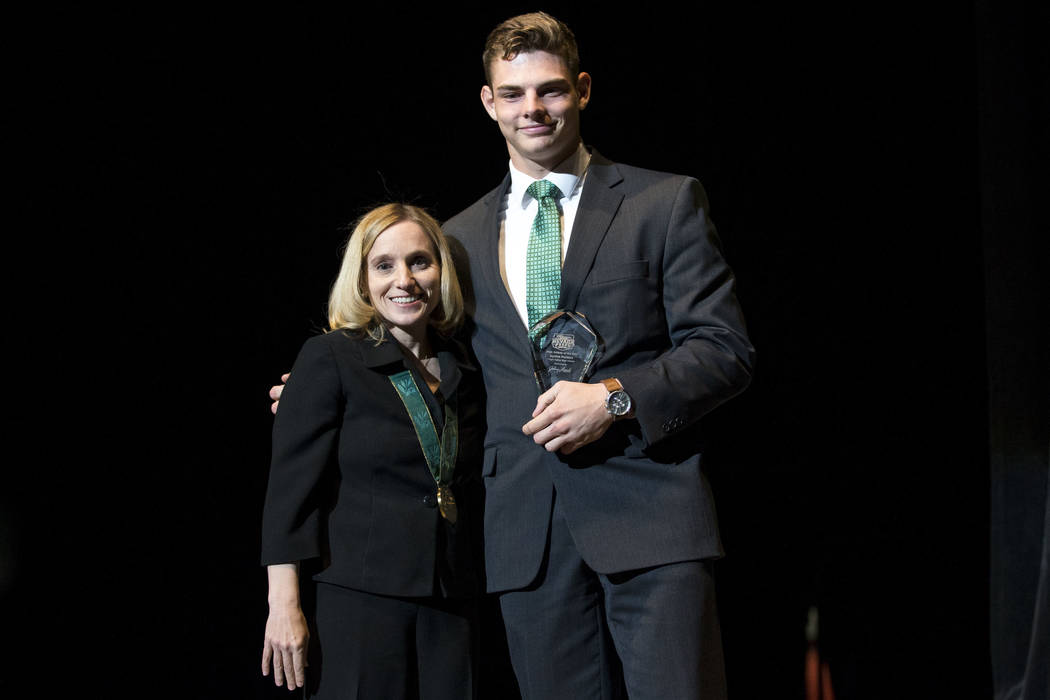 Olympic gold medalist Kerri Strug, left, poses with Jayden Perkins, Virgin Valley High ...