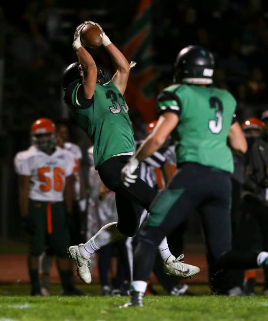 Virgin Valley’s Jayden Perkins (33) catches a pass during the Class 3A state quarterfi ...