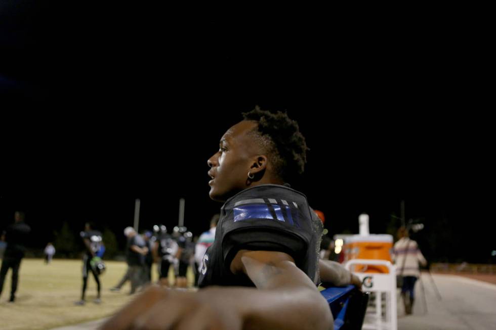 Desert Pines’ quarterback Tyler Williamson, 1, rests during a game against Sunrise Mou ...