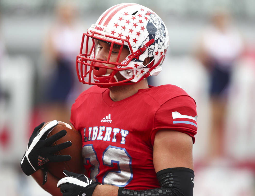 Liberty’s Kyle Beaudry (32) scores a touchdown during a football game against Alta at ...