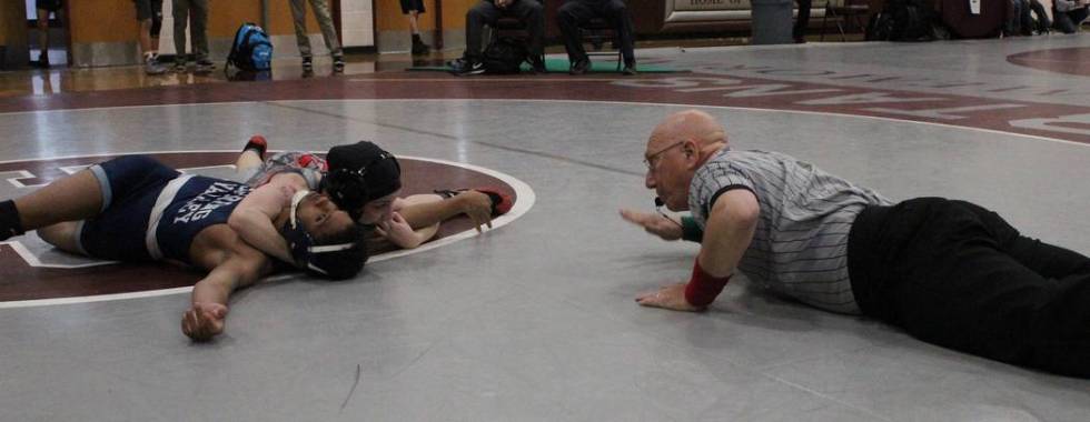 Arbor View 106-pounder Peyton Prussin secures the pinfall over Spring Valley’s Bryan H ...