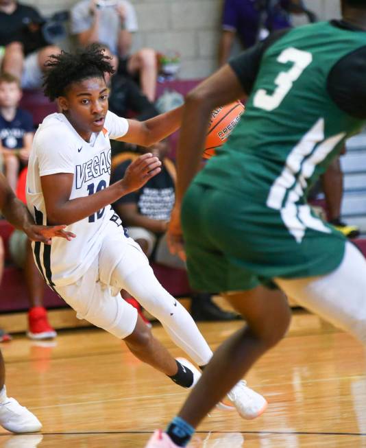 Vegas Elite guard Zaon Collins (10) drives against We All Can Go as part of the Fab 48 tourn ...