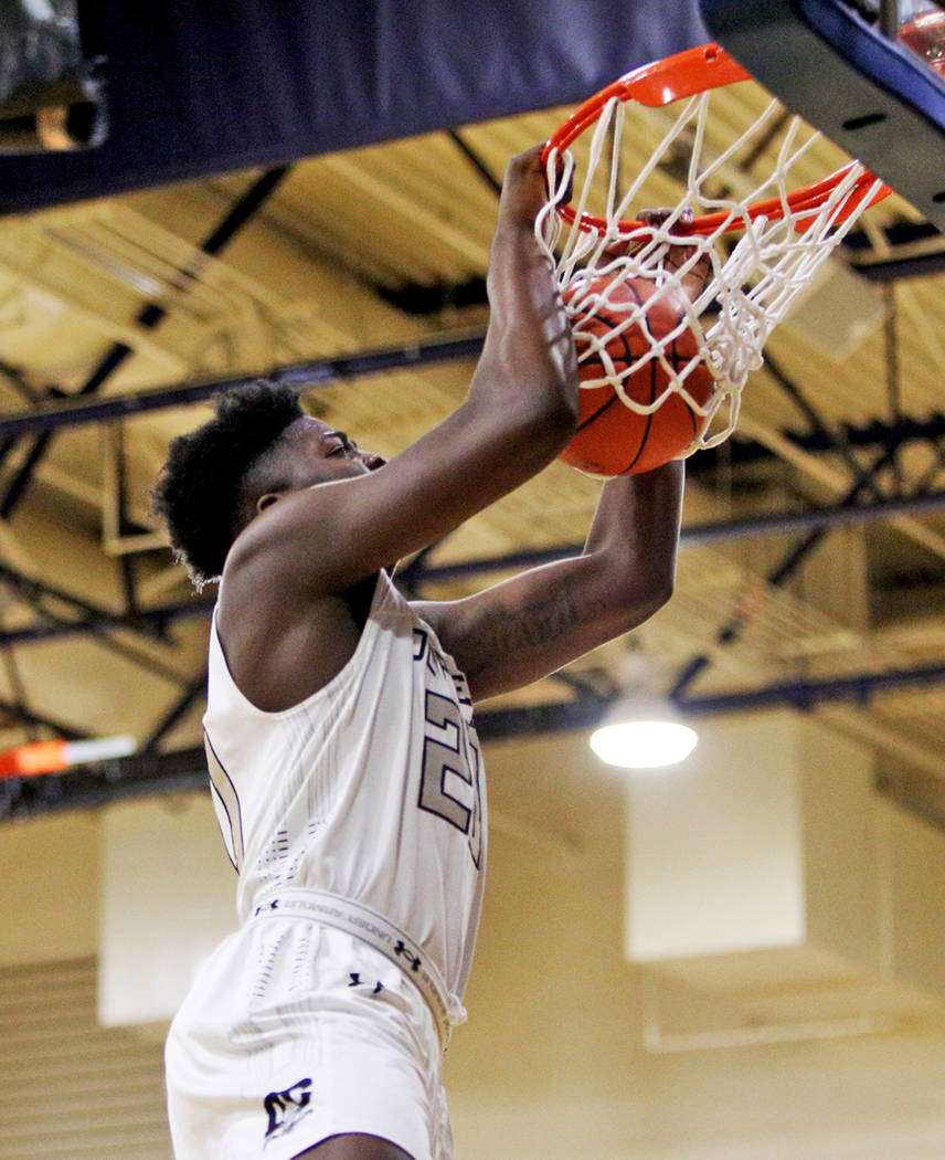 DC Premier’s Makhel Mitchell (20) makes a basket against The Truth at the Fab 48 tourn ...