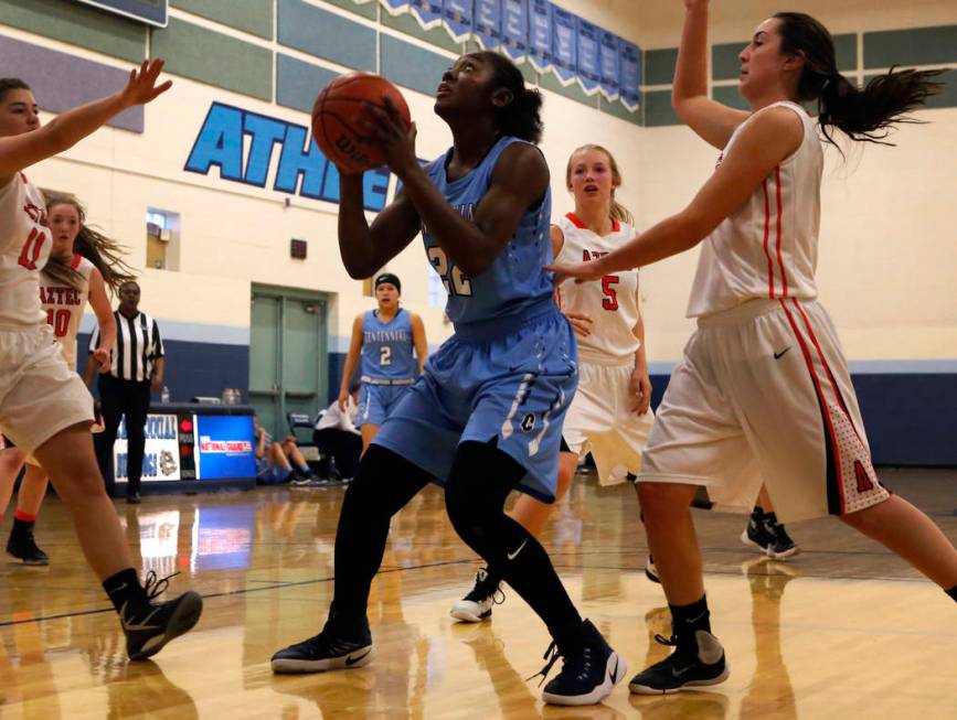 Centennial’s Eboni Walker (22) shoots during a high school basketball game at the Las ...