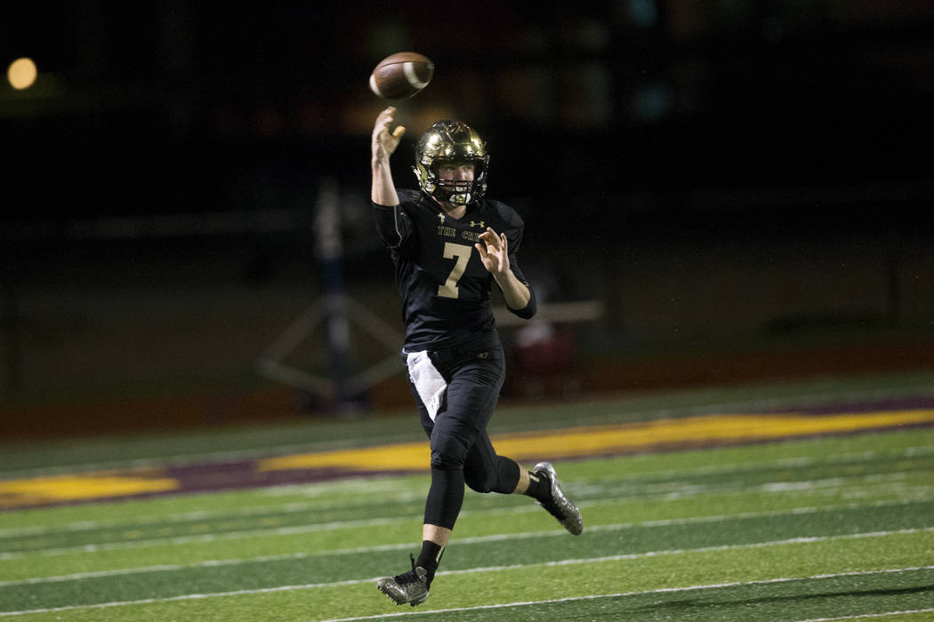 Faith Lutheran’s quarterback Sagan Gronauer (7) throws a pass against Green Valley in ...