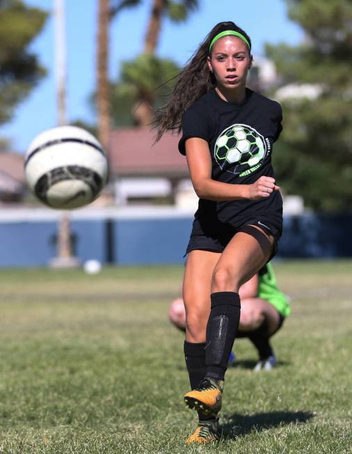 Green Valley’s Taylor O’Neill, 17, passes to a teammate during team practice at ...