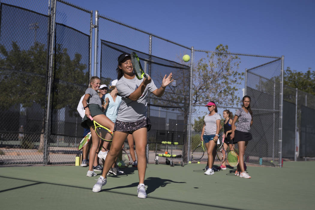 Caroline Hsu, 15, during a team tennis practice at Palo Verde High School in Las Vegas, Wedn ...