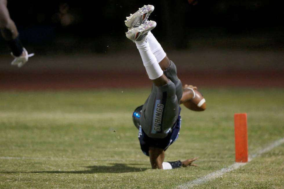 Canyon Springs’ Xavier Delong scores a touchdown against Green Valley High School in t ...