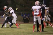 A fight breaks out in the third quarter during the Liberty Patriots road game with the Deser ...