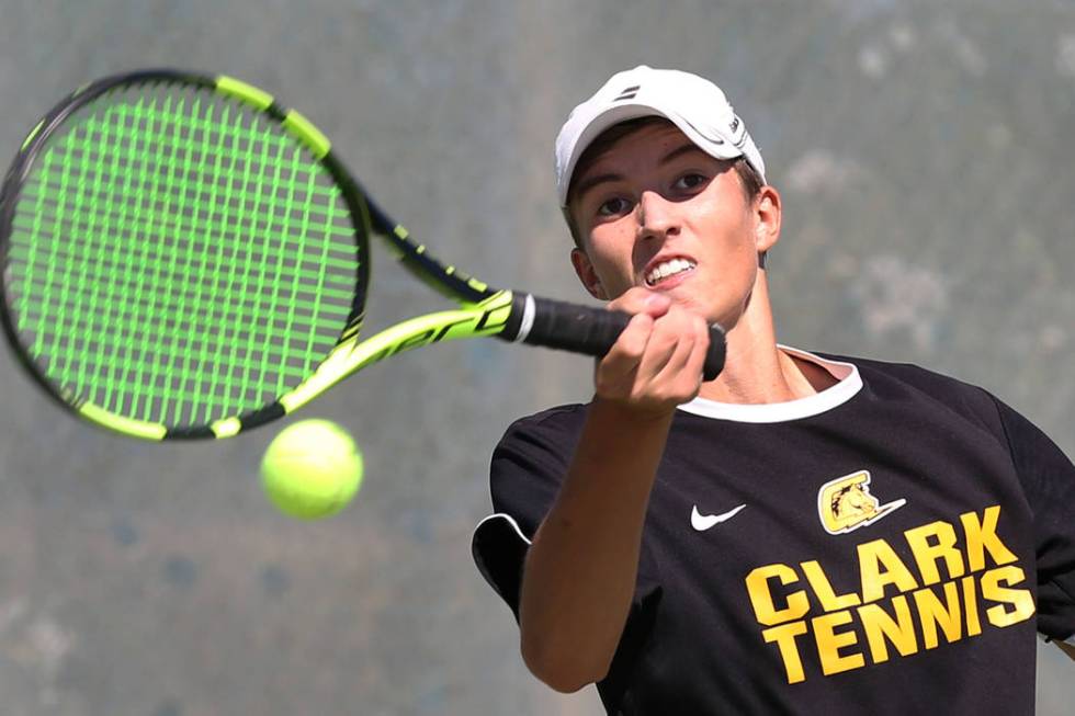 Clark High single player Max Foels returns the ball against Coronado High’s Sebastian ...