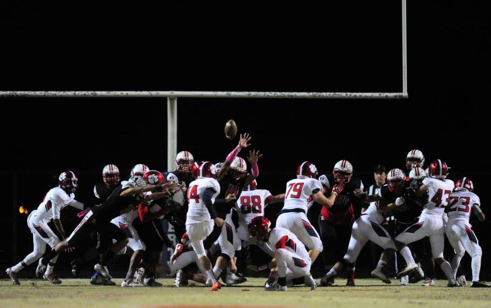 Coronado kicker Coronado Gavin Wale (14) kicks a field goal against Liberty in the first hal ...