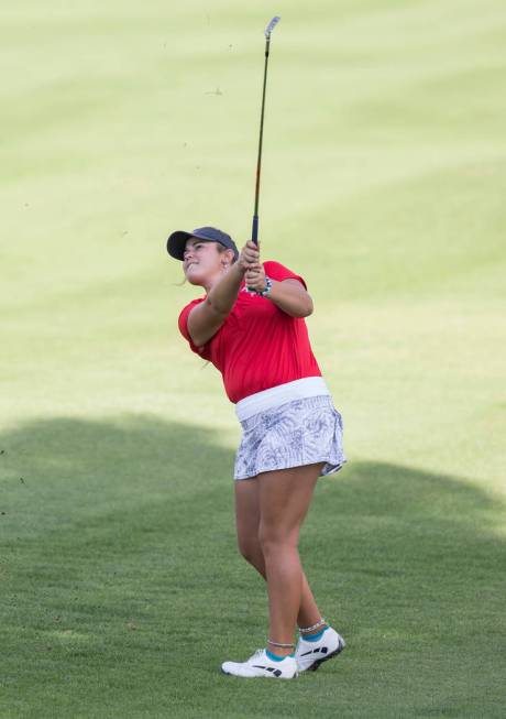 Arbor View’s Kyndall Newman hits an iron at Stallion Mountain Golf Club on Wednesday, ...