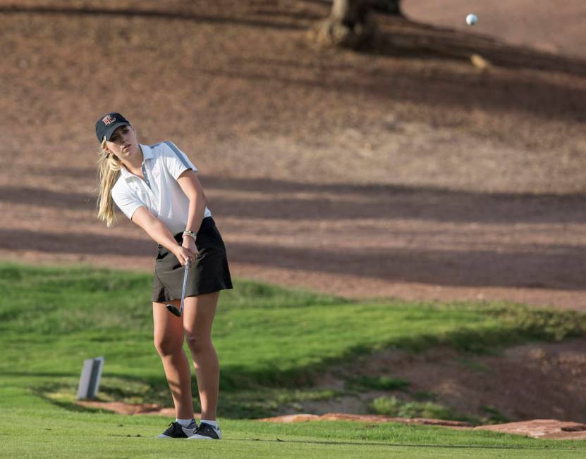 Faith Lutheran sophomore Gracie Olkowski chips onto the green at Stallion Mountain Golf Club ...