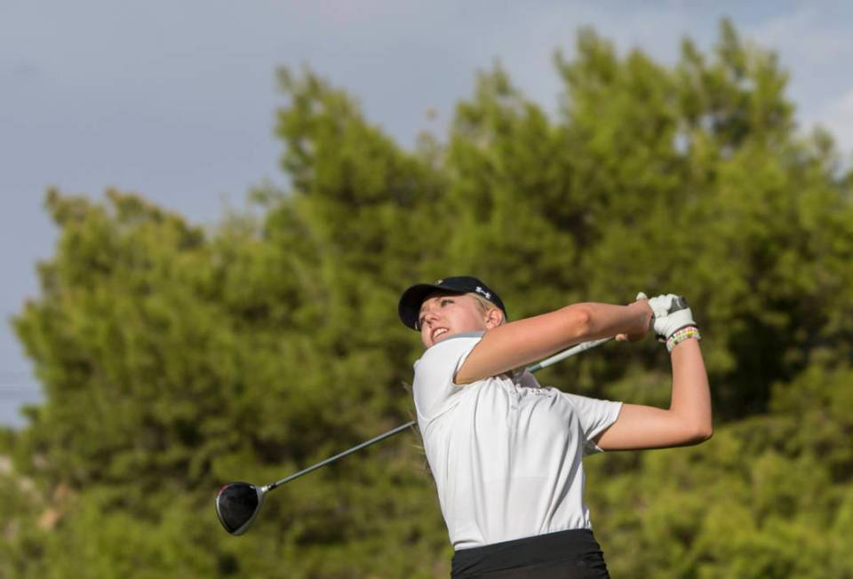 Faith Lutheran sophomore Gracie Olkowski drives the ball at Stallion Mountain Golf Club on W ...