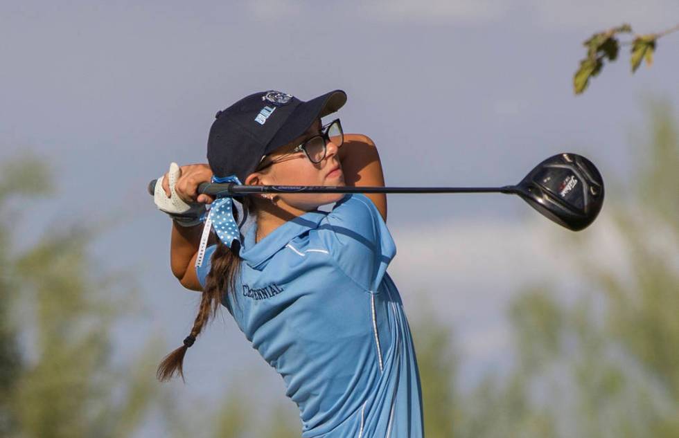 Centennial sophomore McKenzi Hall drives the ball at Stallion Mountain Golf Club on Wednesda ...