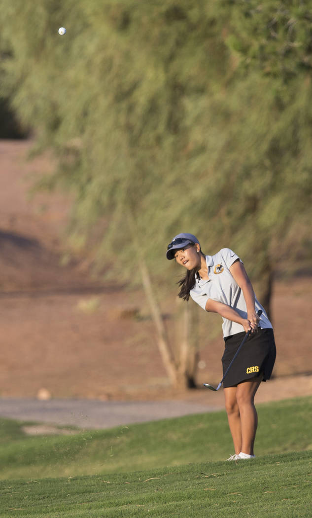 Clark sophomore Riana Mission hits an iron at Stallion Mountain Golf Club on Wednesday, Oct. ...