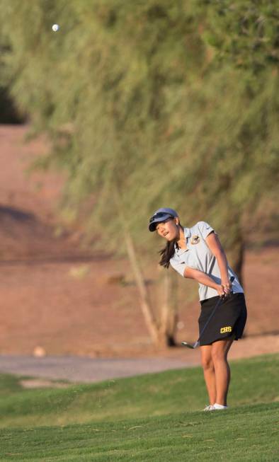 Clark sophomore Riana Mission hits an iron at Stallion Mountain Golf Club on Wednesday, Oct. ...