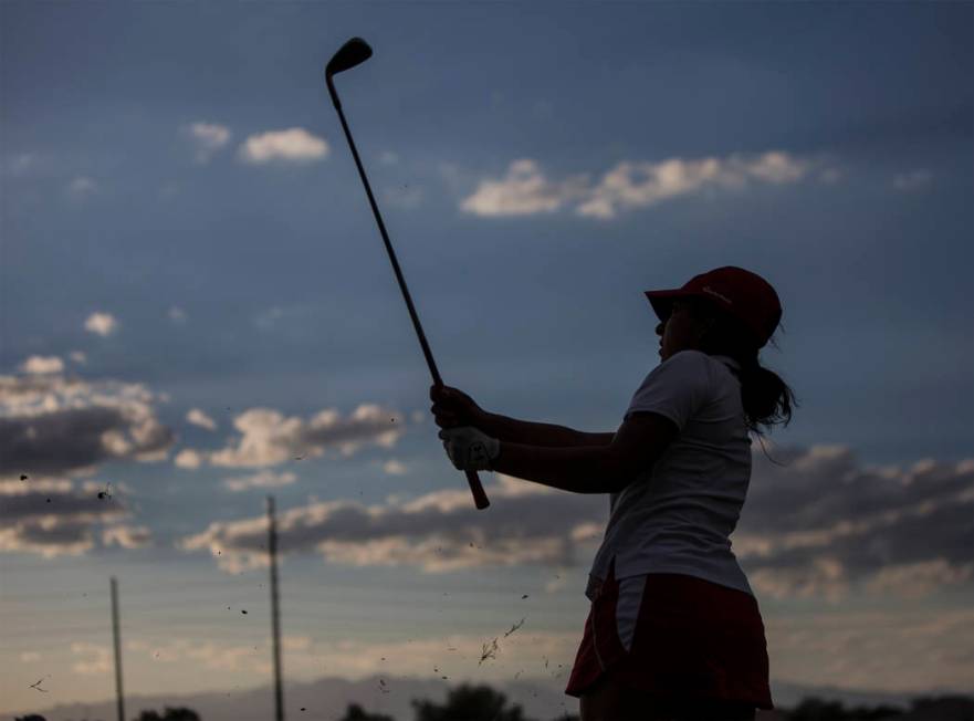 Coronado’s Victoria Estrada chips onto the green at Stallion Mountain Golf Club on Wed ...