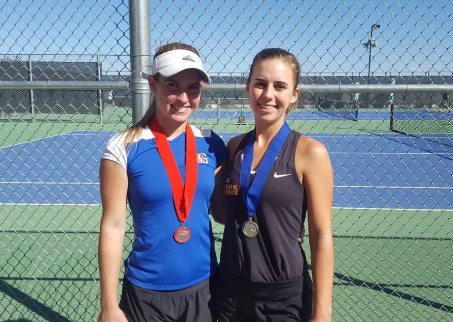 Clark’s Audrey Boch-Collins, right, and Bishop Gorman’s Angelique Friedrich embr ...