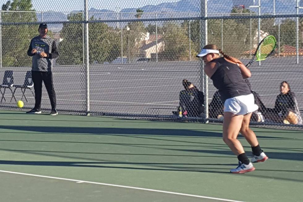 Palo Verde senior Shelby Graber prepares to return a shot in her singles match against Bisho ...