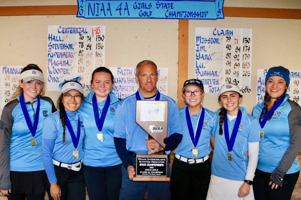 The Centennial girls golf team celebrates its Class 4A state golf championship at Dayton Val ...