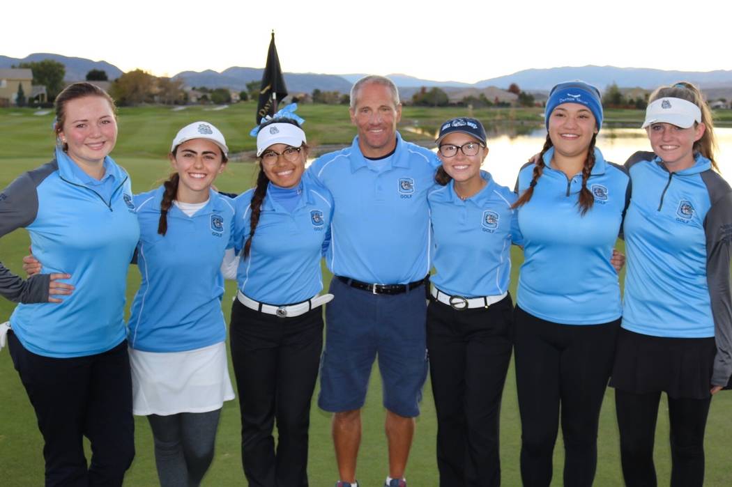 Centennial’s golf team poses after winning the Class 4A state golf championship at Day ...