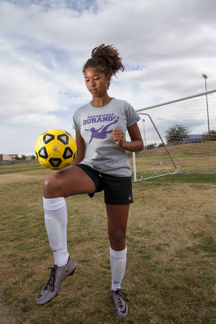 Durango senior soccer player Laila Loring dribbles the ball before practice at Durango High ...