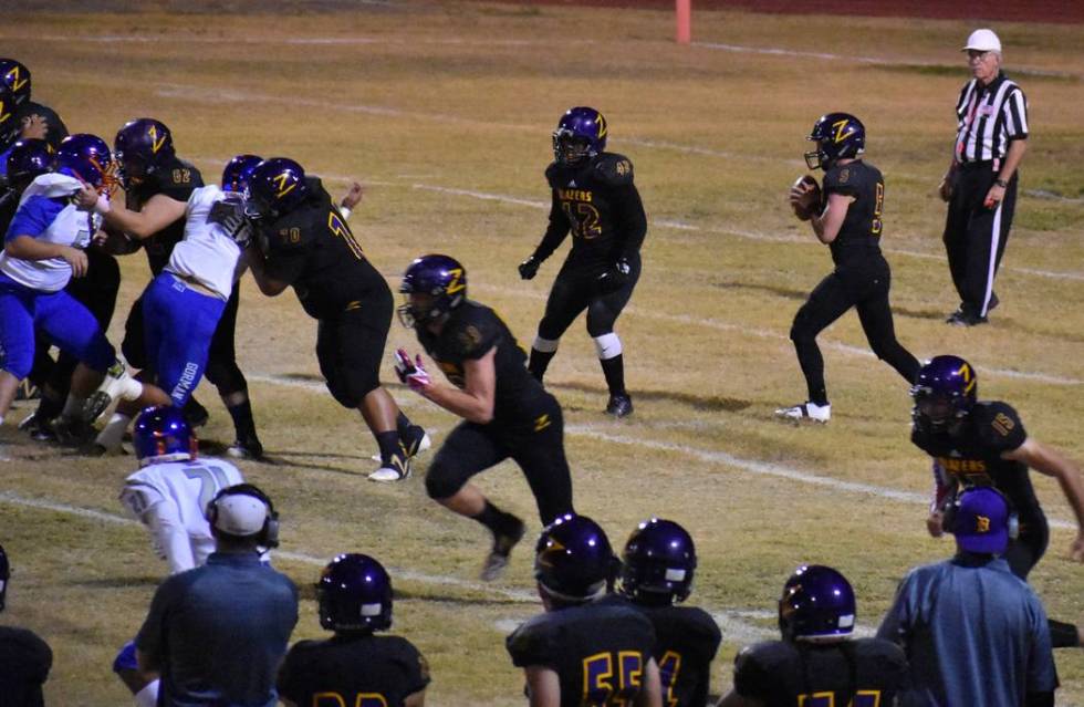 Durango’s Kaden Renshaw drops back to pass on Friday against Bishop Gorman. (Courtesy ...