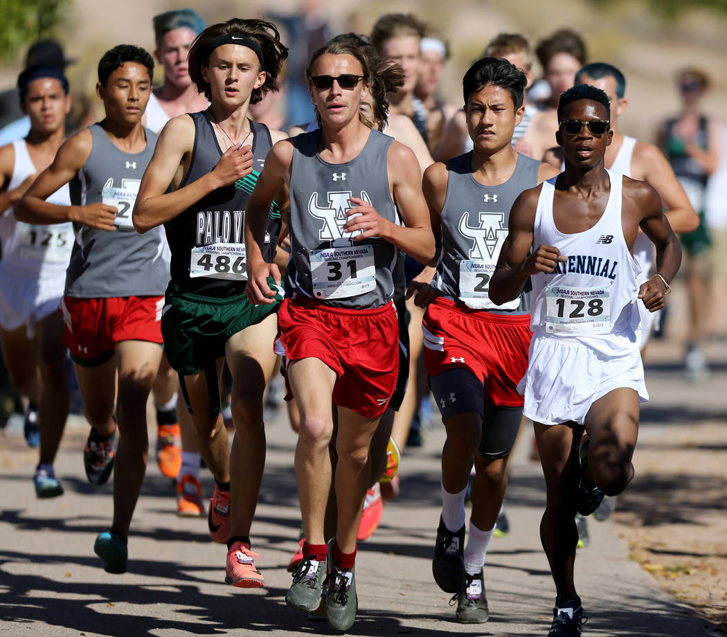 Runners during the 4A Mountain boys cross country region race at Veteran’s Memorial Pa ...