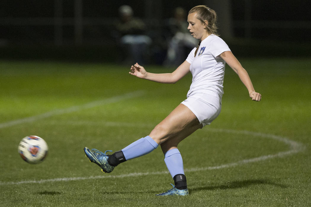 Foothill senior Aqui Williams (13) scores the game winning kick in the second half to beat G ...