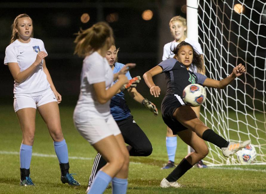 Green Valley junior forward Jazlyn Camacho (15) scores a second half goal against Foothill H ...