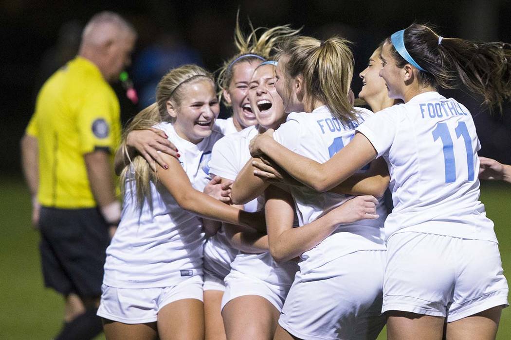 Foothill High School players celebrate after scoring a last second goal in the second half t ...