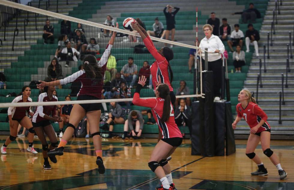 Las Vegas High School’s Rimonee Wright hits the ball over the net against Cimarron Mem ...