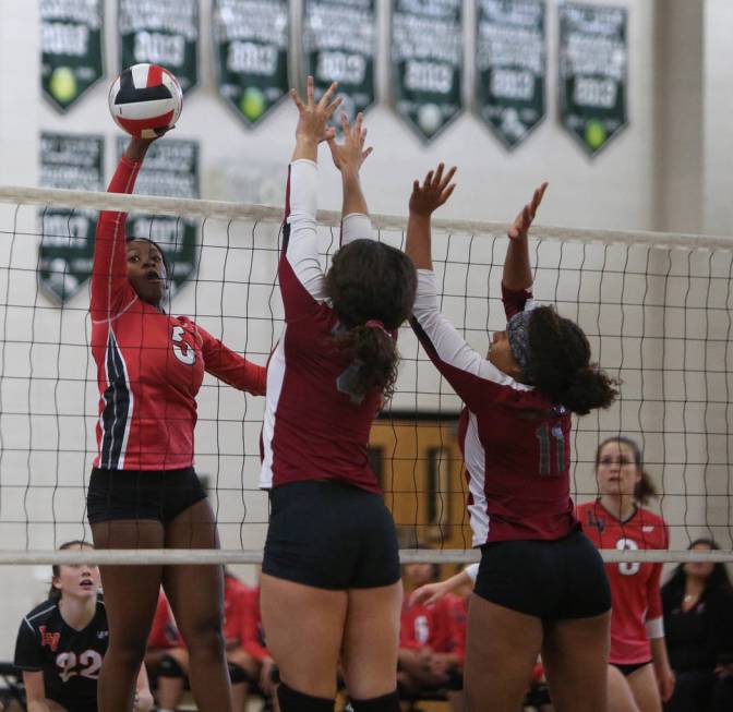 Las Vegas High School’s Rimonee Wright sets the ball over the net as Cimarron Memorial ...