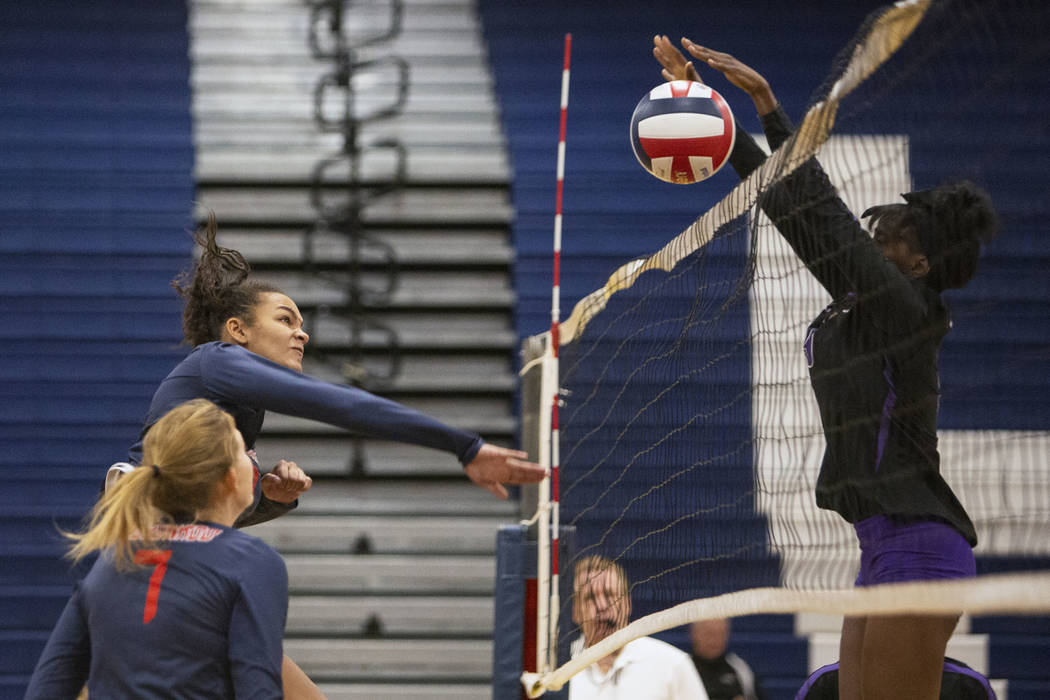 Durango’s Shakayla Scarbrough blocks the ball after Coronado’s Brooke Dobson sen ...