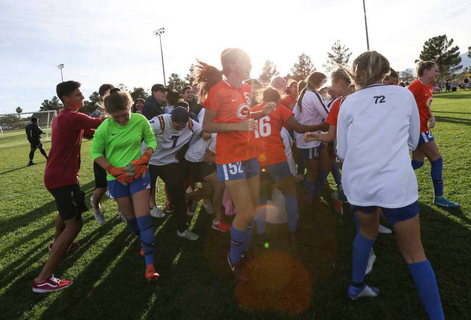 Bishop Gorman players celebrate their win over Coronado in the Desert Region girls soccer ch ...