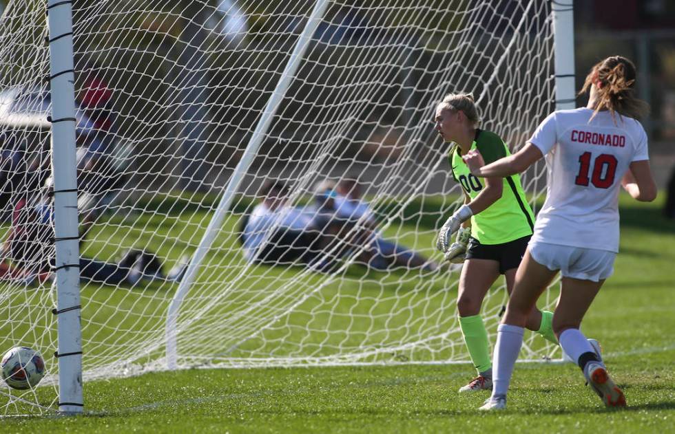 Coronado’s Taylor Book gives up a goal to Bishop Gorman’s Kevyn Hillegas (24) du ...