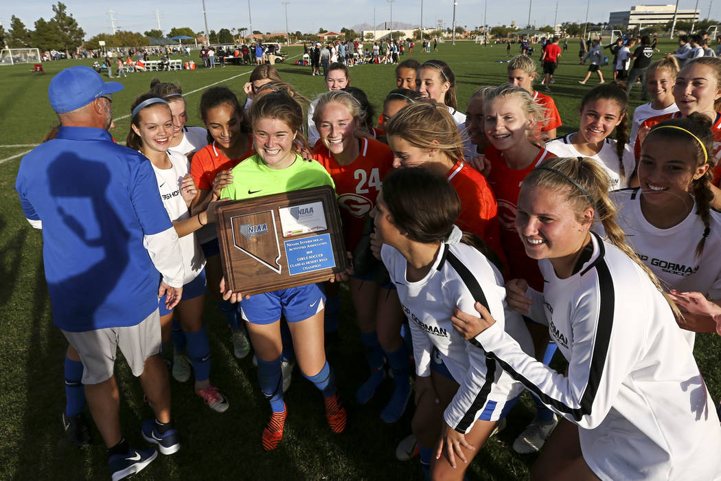 Bishop Gorman players celebrate their win over Coronado in the Desert Region girls soccer ch ...