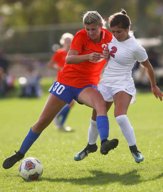 Bishop Gorman’s Gianna Gourley (30) battles for the ball against Coronado’s Hale ...