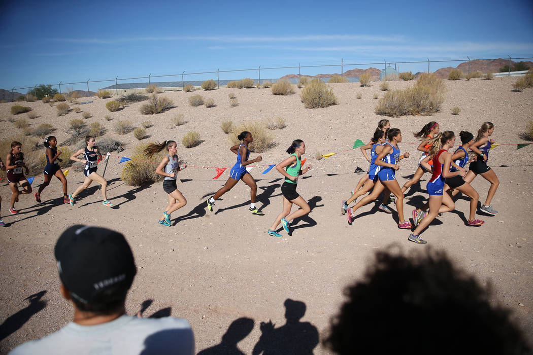 Runners compete during the NIAA 4A Girls Cross Country State Championship at the Veteran&#82 ...