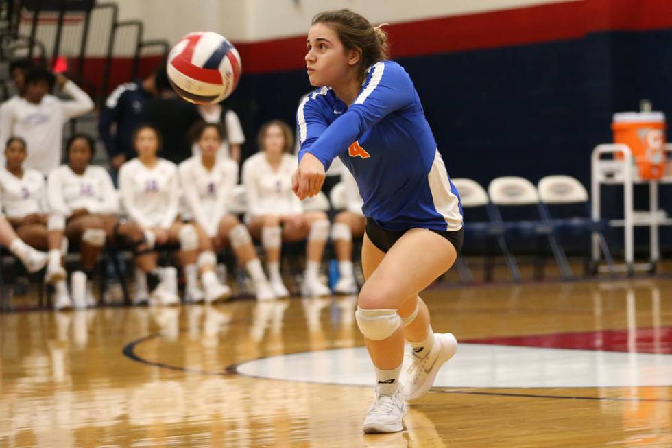 Bishop Gorman’s Natalie Mavroidis (4) saves the ball against Palo Verde during the thi ...