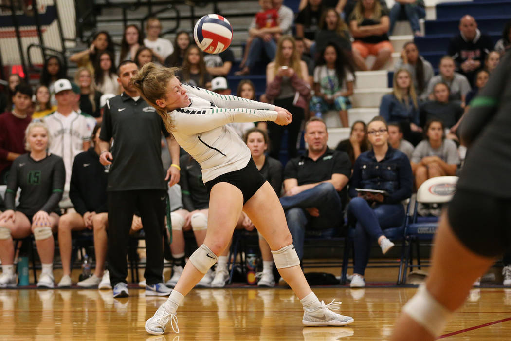 Palo Verde’s Mia Sadler (17) saves the ball against Bishop Gorman during the third set ...