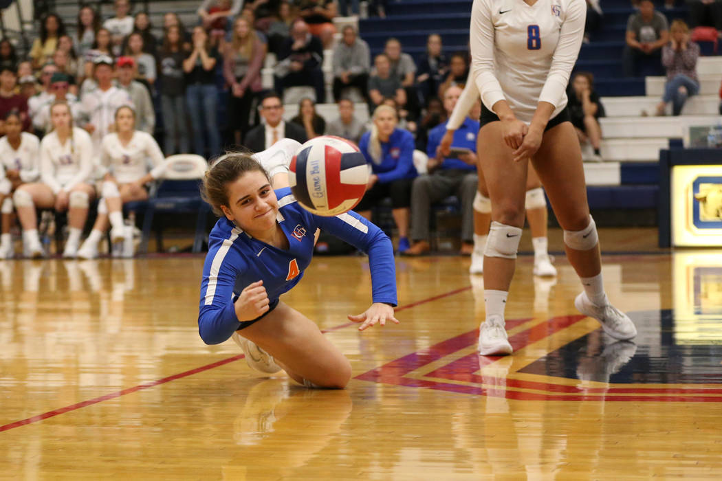 Bishop Gorman’s Natalie Mavroidis (4) watches as the ball drops to the floor against P ...