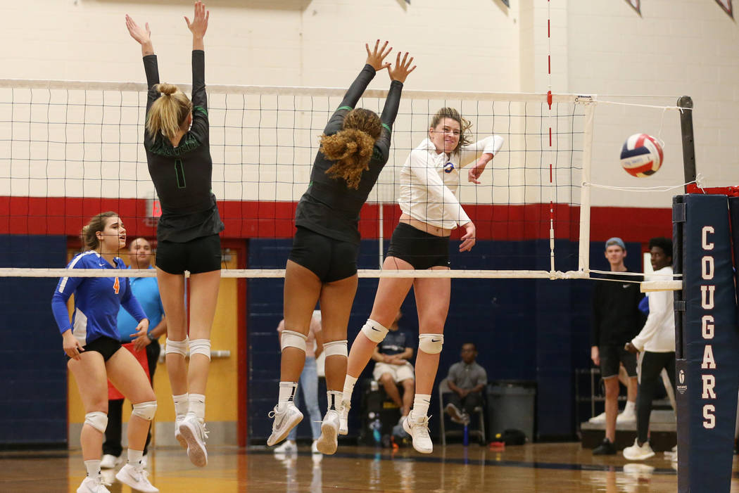 Bishop Gorman’s Tommi Stockham (3) connects with the ball for a point against Palo Ver ...